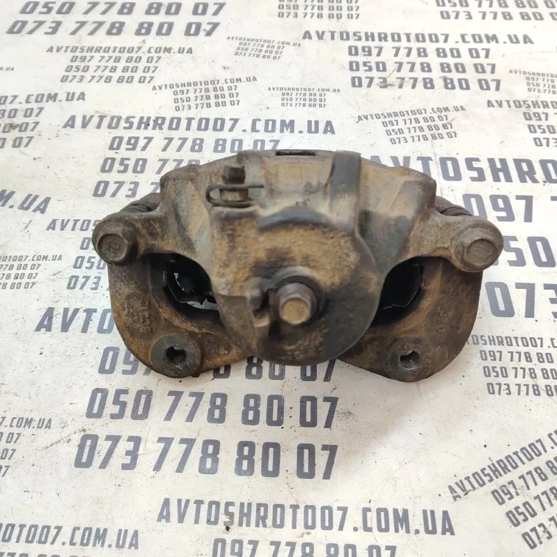 Тормозний супорт Hyundai Sonata IV (98-05) 2.0 перед. лівий