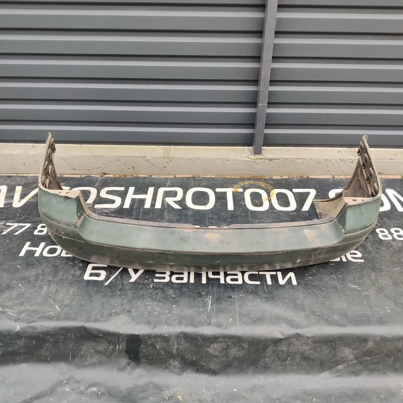 Бампер Volkswagen Bora (98-05) 1.9 TDI задній OEM 1j9807421