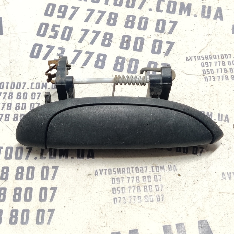 Ручка зовнішня Dacia Logan (04-12) 1.6 ліва OEM 7700433076