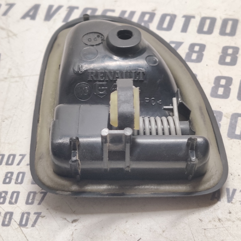 Дверна ручка Dacia Logan (04-12) 1.6 ліва OEM 7700830078