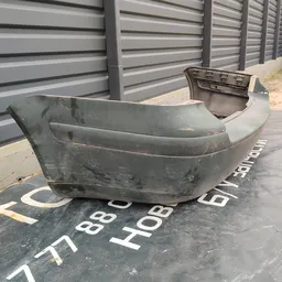 Бампер Volkswagen Bora (98-05) 1.9 TDI задній OEM 1j9807421