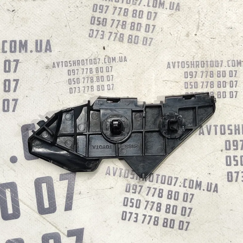 Кронштейн бампера Toyota Corolla (06-13) зад лів 5215812090