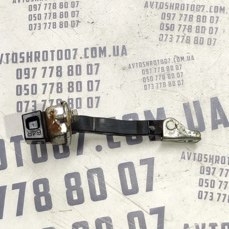 Обмежувач дверей Mitsubishi Outlander XL 06-12 2.0D зад лів