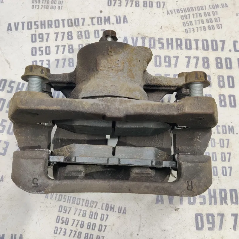 Супорт Toyota Corolla (06-13) 1.6 Бензин передній правий