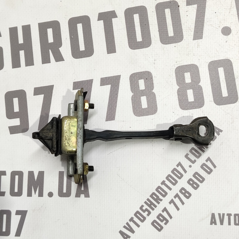 Обмежувач дверей Mazda Premacy (99-05) 1.8 передній правий