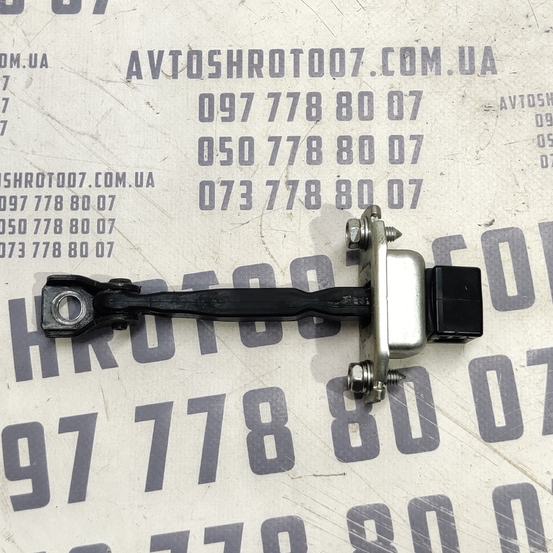 Обмежувач дверей Mitsubishi Outlander XL 06-12 2.0D Перед Пр