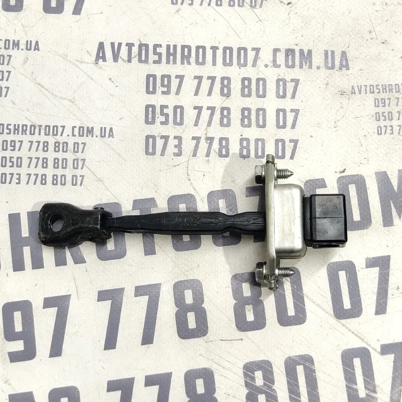 Обмежувач дверей Mitsubishi Outlander XL 06-12 2.0D Перед Пр