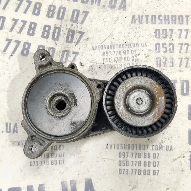 Ролик натяжний Mitsubishi Outlander XL 06-12 2.0D 1345a013