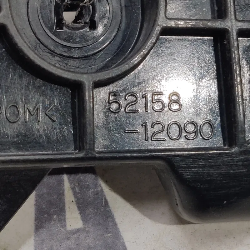Кронштейн бампера Toyota Corolla (06-13) зад лів 5215812090