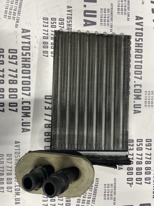 Радіатор пічки Skoda Octavia (96-10) 1.6 бенз OEM 1H1819031A