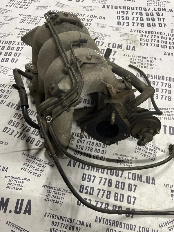 Впускний колектор Mazda 626 GE 91-98 1.8 бенз OEM FS0113100D