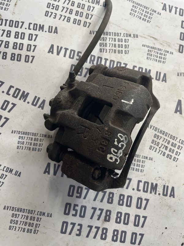 Супорт Mitsubishi Lancer 9 03-08 1.3 перед лів OEM MB950176