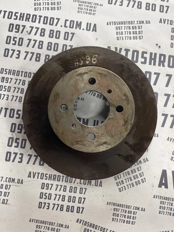 Гальмівний диск Mitsubishi Lancer 9 1.3 передній MB699285