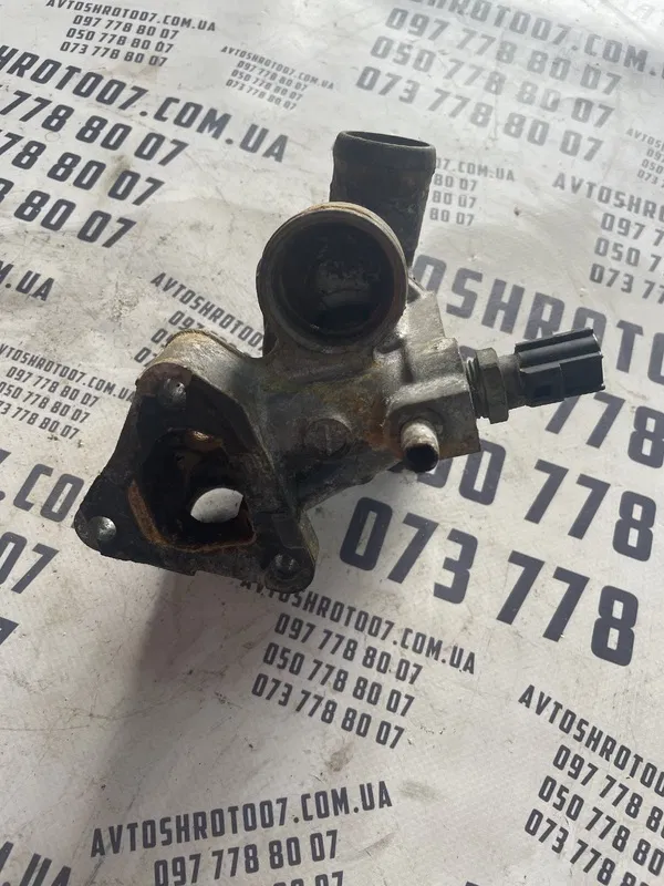 Корпус термостата Mitsubishi Lancer 9 (03-08) 1.3 OEM 500002