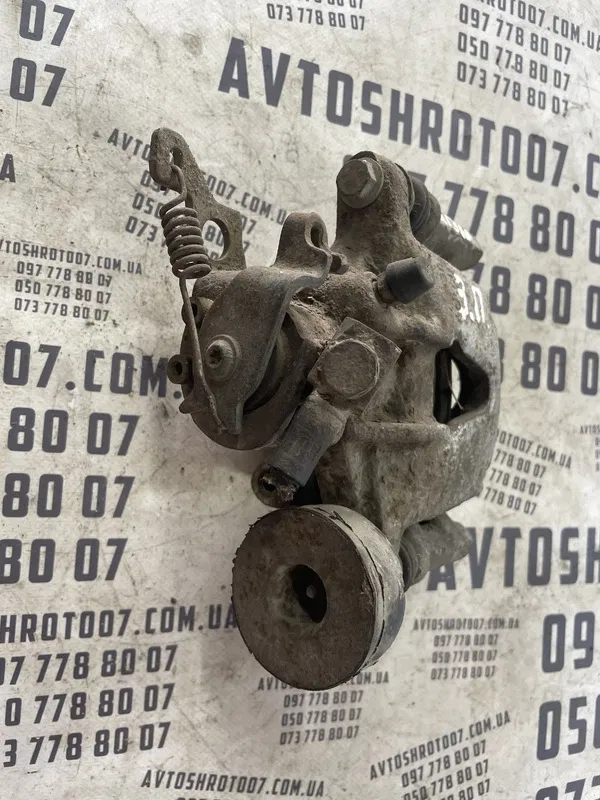 Супорт Jaguar X-Type 01-09 2.1 V6 зад. прав. OEM 0204y01172