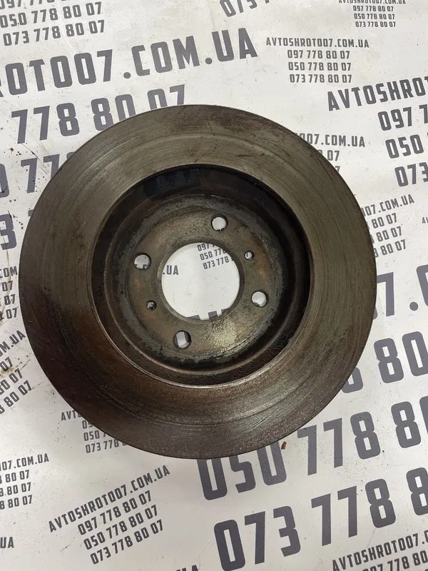 Гальмівний диск Mitsubishi Lancer 9 1.3 передній MB699285
