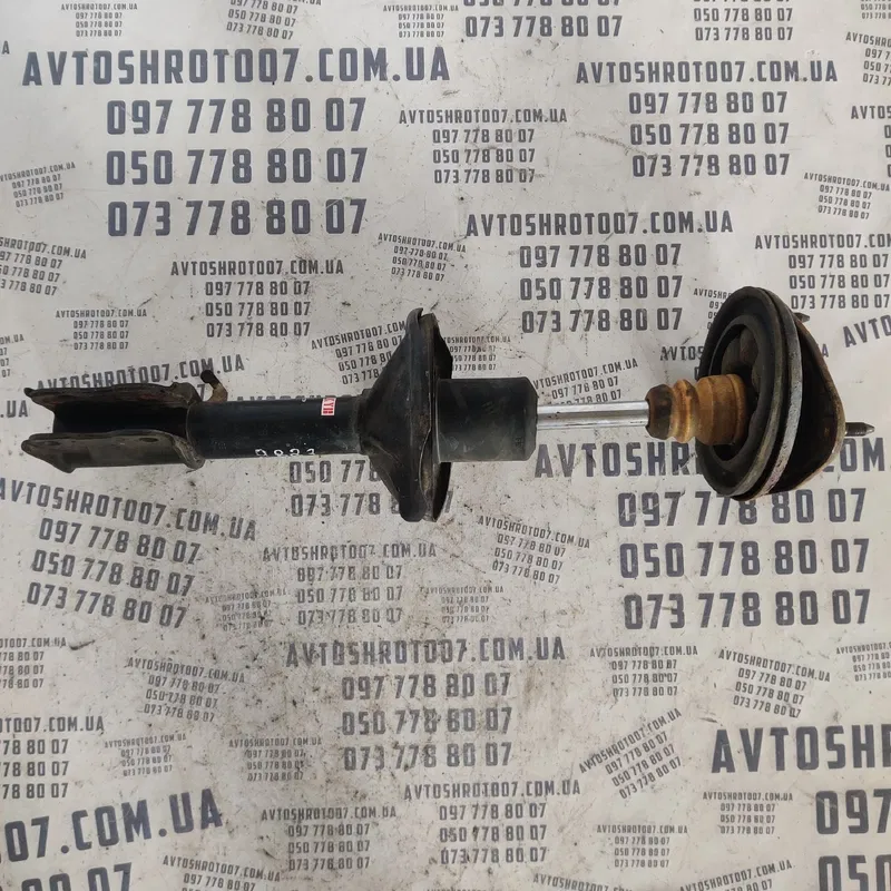 Амортизатор Mitsubishi Lancer 9 (03-08) передній OEM 2333381