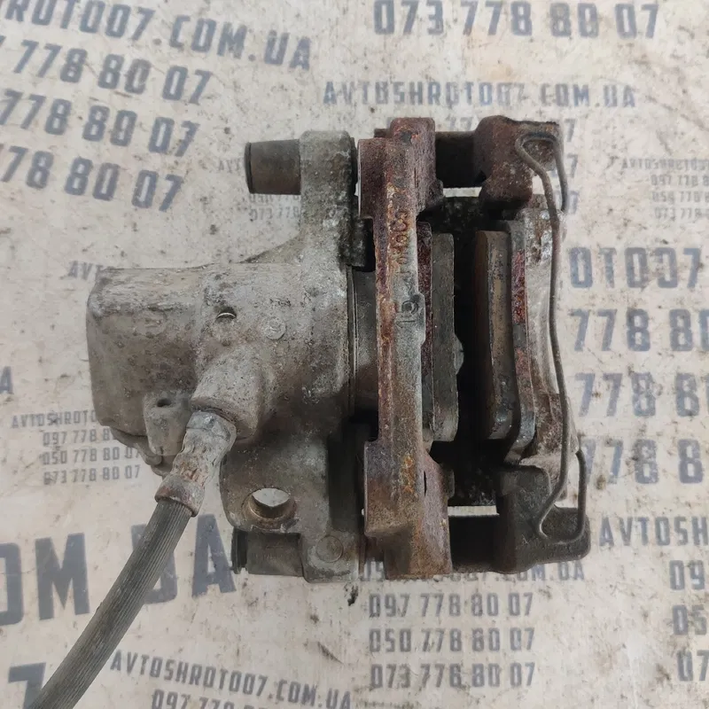 Тормозний супорт Mazda 3 BK передній правий OEM 619802H105S