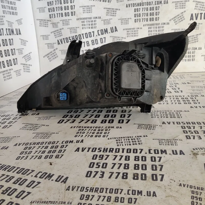 Фара Ford Focus MK1 (98-04) передня права OEM xs4113005