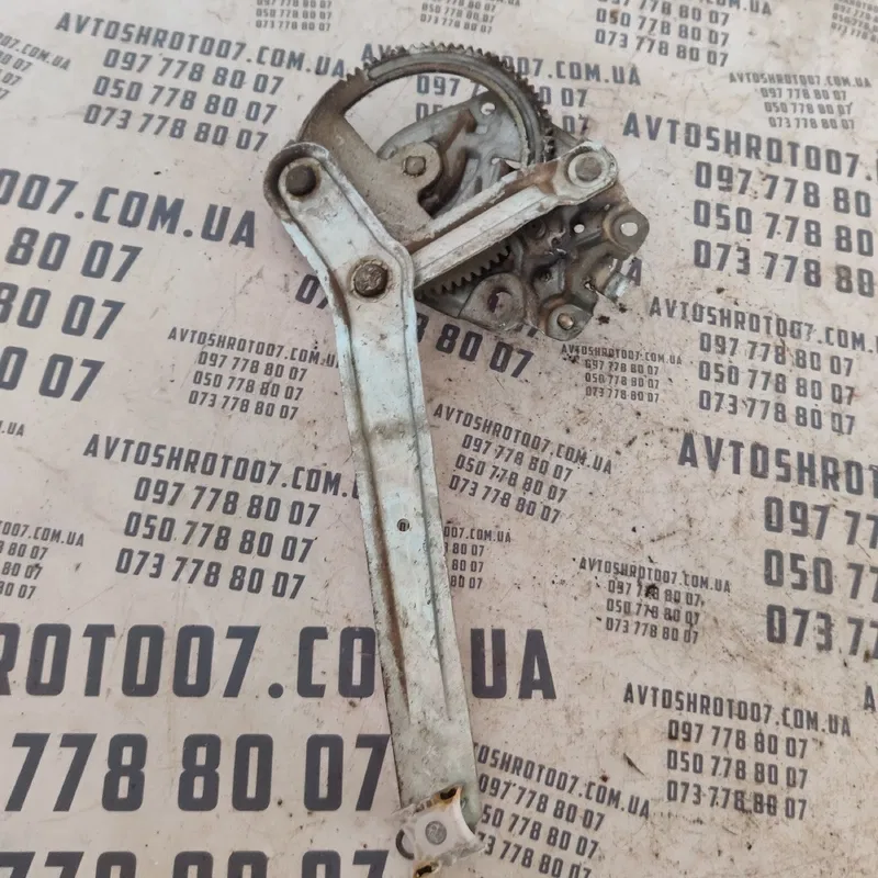 Склопідіймач BMW 316 E36 (90-00) зад. лівий OEM 513481197710