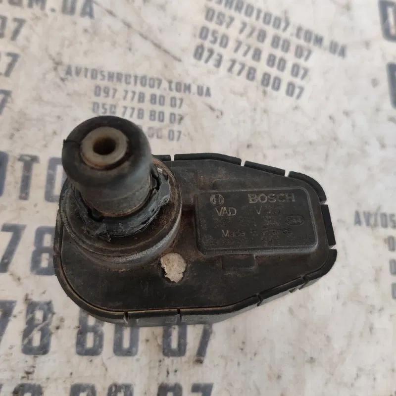 Коректор фар VW Jetta (10-18) OEM 0307851305 321941295a