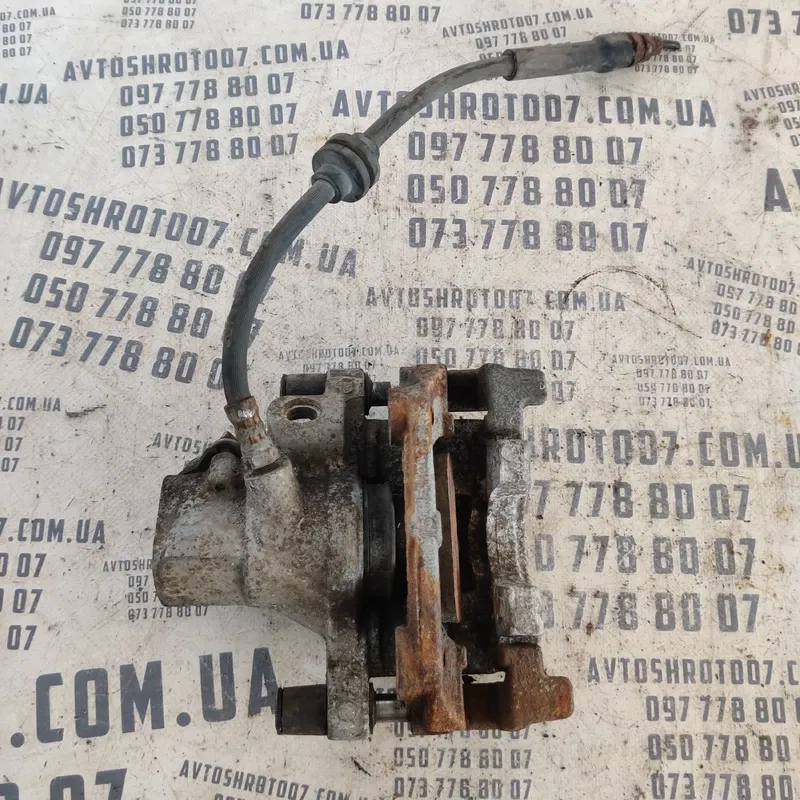 Тормозний супорт Mazda 3 BK (03-09) зад. лів. OEM 2008814LBO