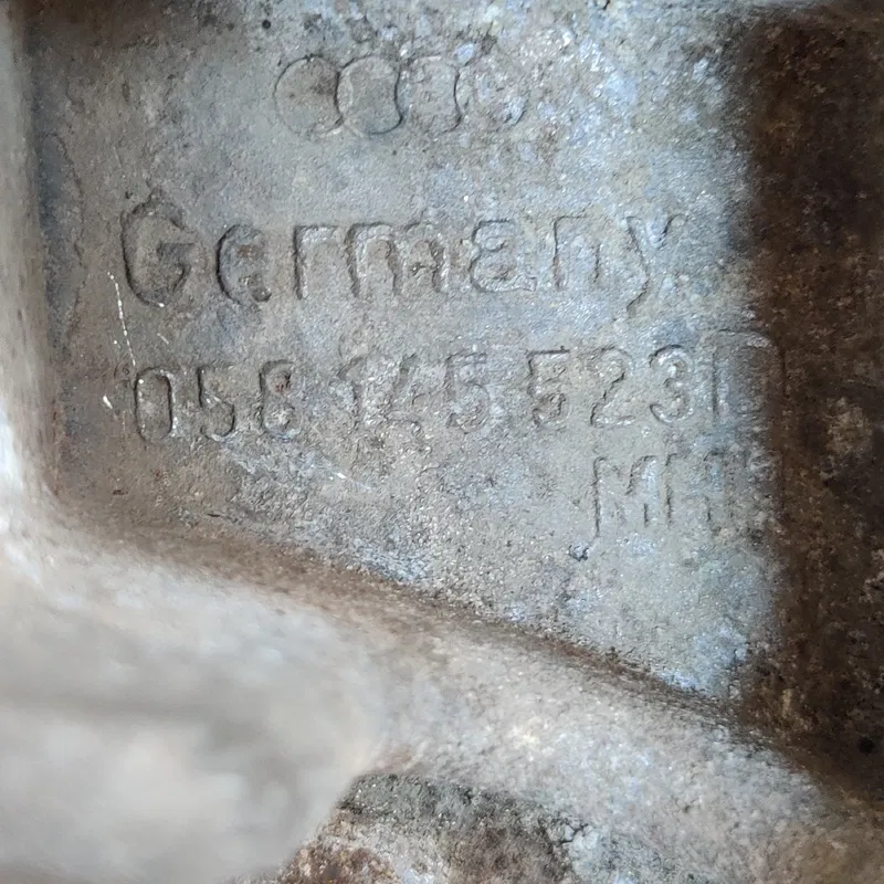 Кронштейн генератора VW Passat B5 (96-05) OEM 058145523d