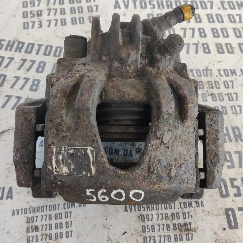 Супорт передній лівий Peugeot Partner 1 OEM 9625739880