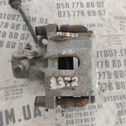 Тормозний супорт Mazda 3 BK передній правий OEM 619802H105S