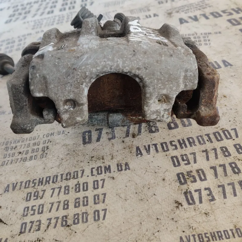 Тормозний супорт Mazda 3 BK (03-09) зад. лів. OEM 2008814LBO