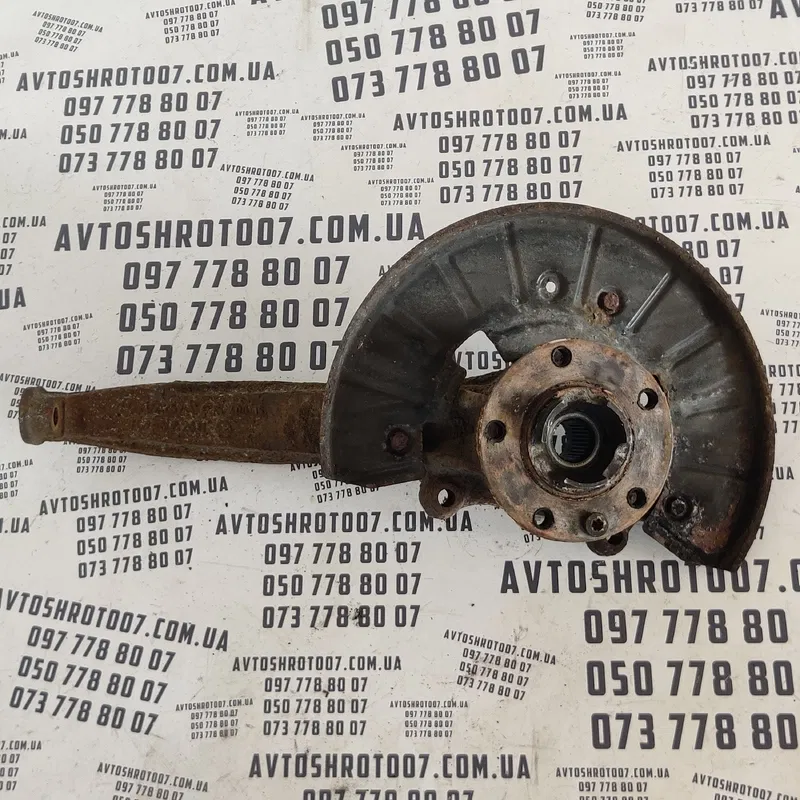 Цапфа Audi Q7 4L (05-15) 3.6 Бенз перед ліва OEM 7LC407257A