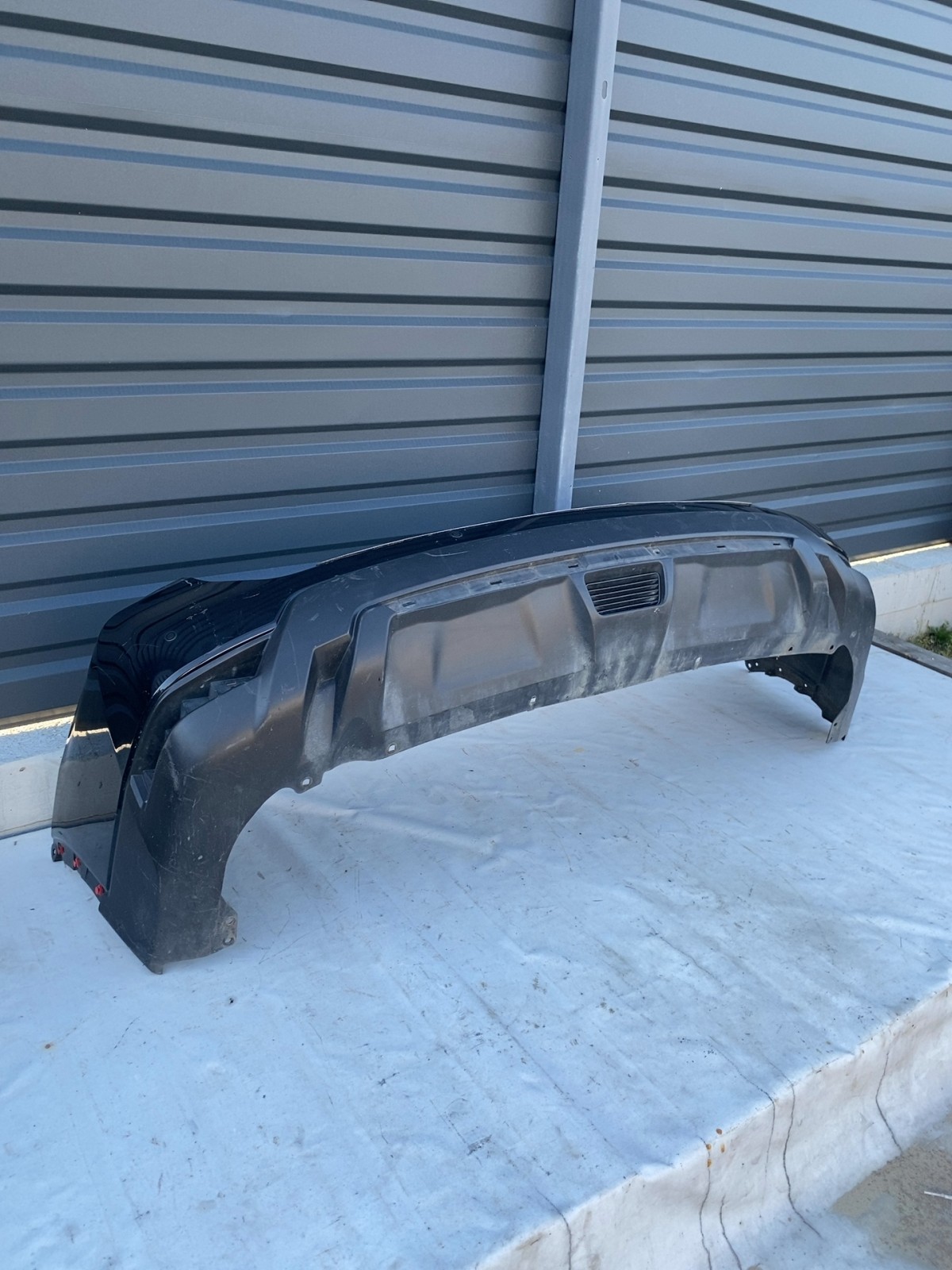 Бампер задній Nissan Rogue T32 OEM 850226FL0H
