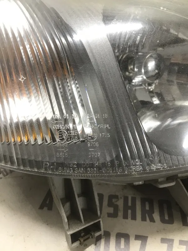 Фара Chevrolet Tacuma (00-08) 2.0 Бенз. Права OEM 0301001116