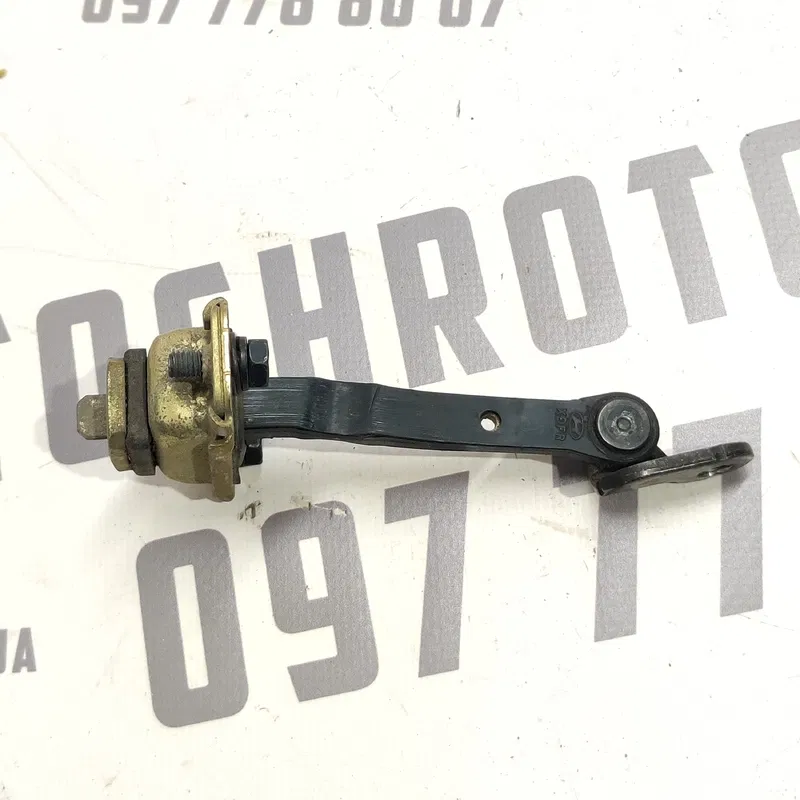 Обмежувач дверей Hyundai Elantra 3 00-06 1.6 передній правий