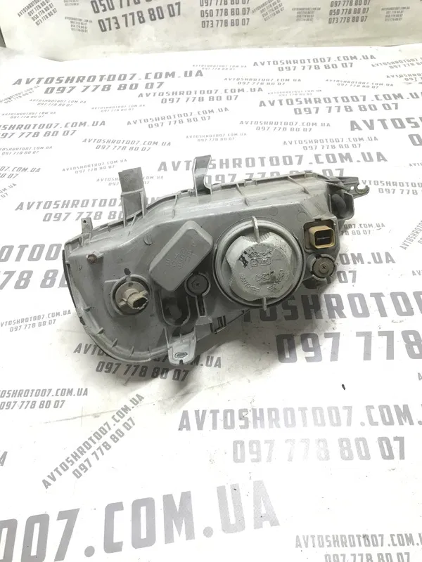 Фара Chevrolet Tacuma (00-08) 2.0 Бенз. Права OEM 0301001116