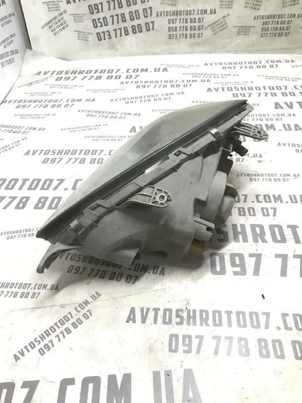 Фара Chevrolet Tacuma (00-08) 2.0 Бенз. Права OEM 0301001116