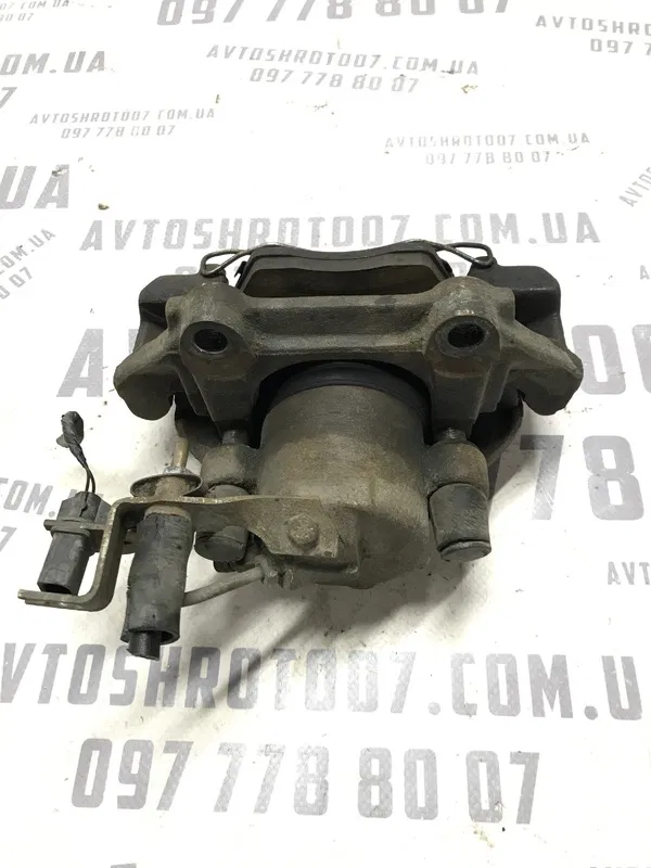 Тормозний супорт VW Passat B5+ (00-05) 1.9 Diesel перед лів