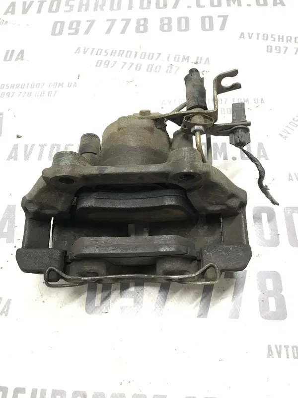 Тормозний супорт VW Passat B5+ (00-05) 1.9 Diesel перед лів
