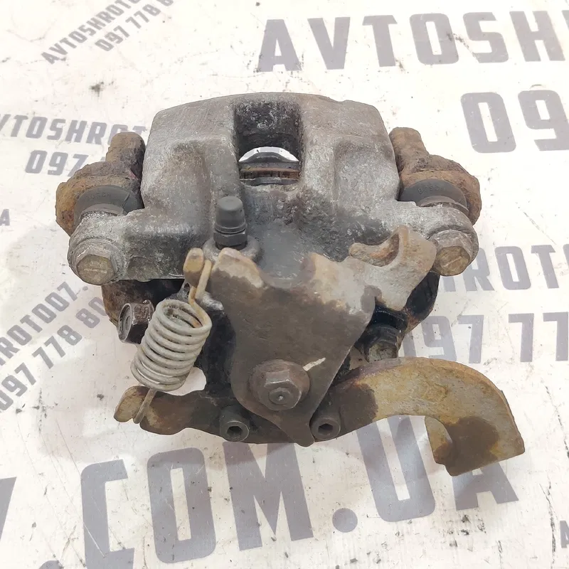 Тормозний супорт Toyota Auris (06-12) 1.6 Benz задній правий