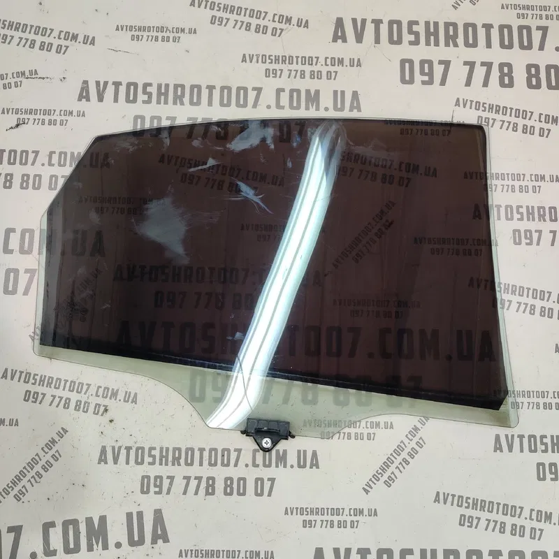 Скло дверей заднє ліве Hyundai Elantra 4 (06-11) 834112H010