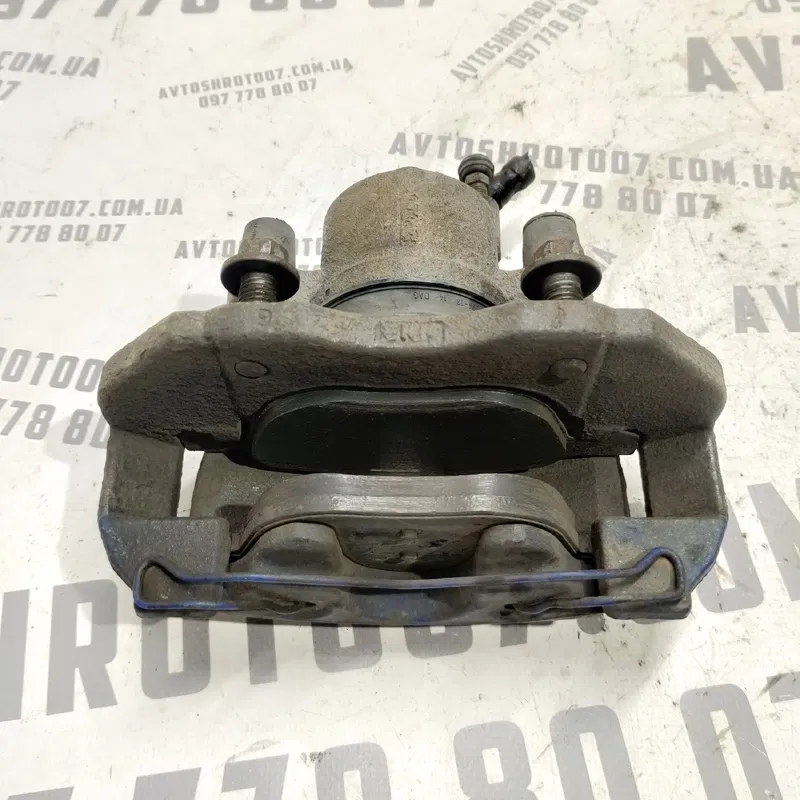 Тормозний супорт Ford Focus MK2 (04-11) 1.6D перед. правий