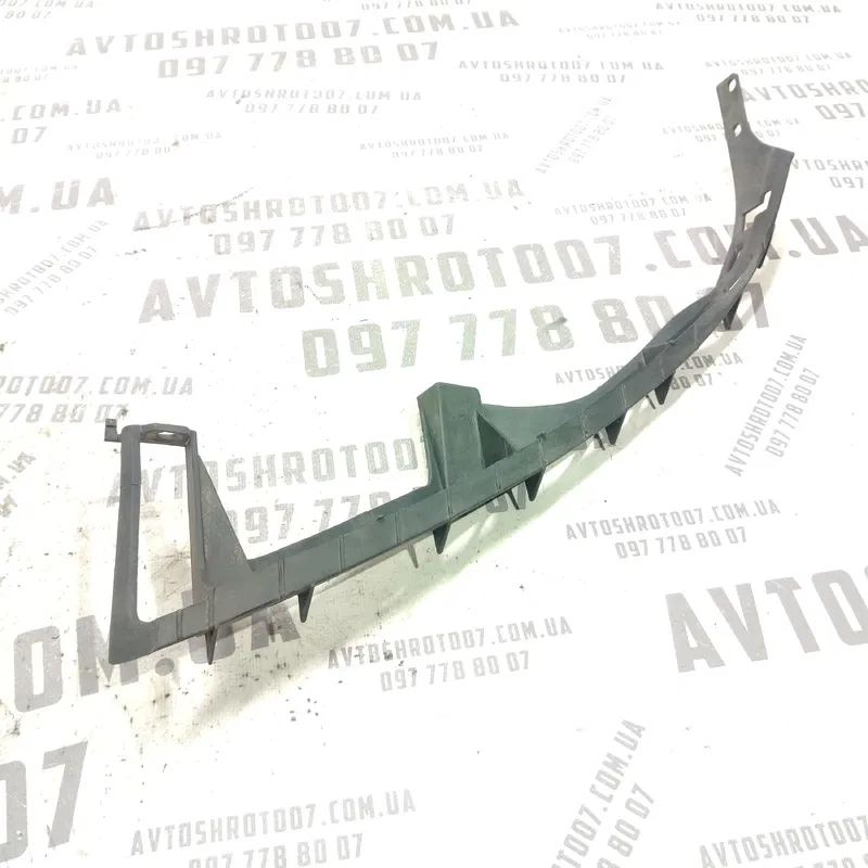 Кронштейн бампера передній лівий Mazda 6 GY (02-07) 2.0