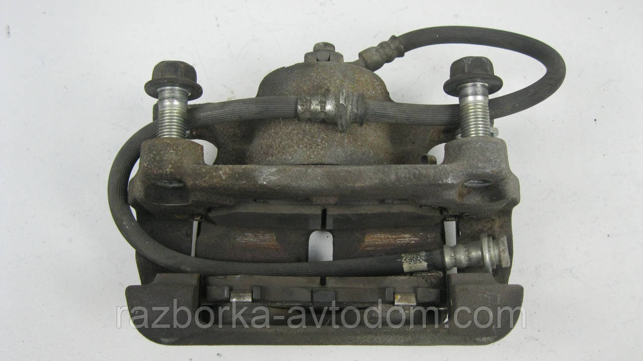 Суппорт передній правий Nissan Qashqai J10, X-Trail T31, T32, Rogue Дефект OE: 410014BA0A