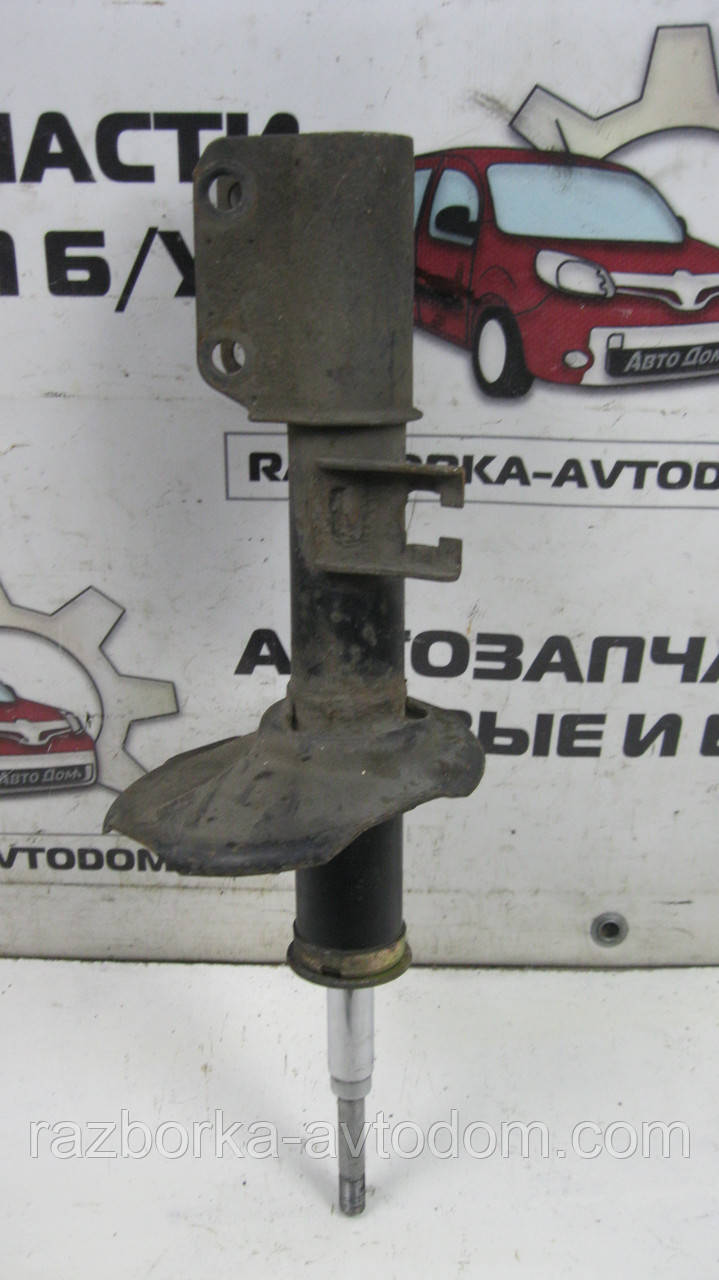 Амортизатор передній лівий Subaru Justy 2 (1995-2003), Suzuki Swift 2 (1989-2005) OE:4160280E20