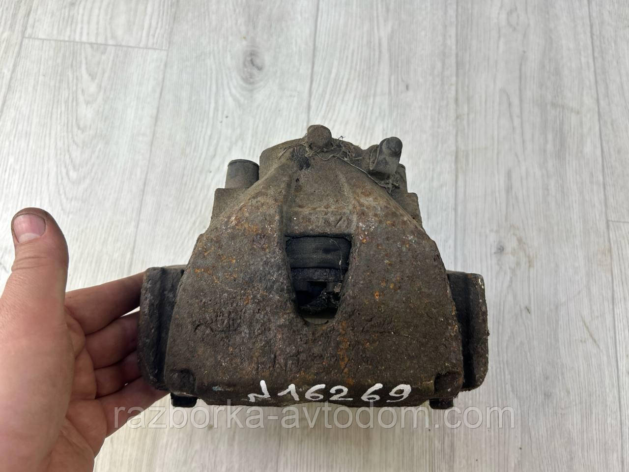 Суппорт передній лівий Opel Zafira B (05-10) OE:5542106, 93173271