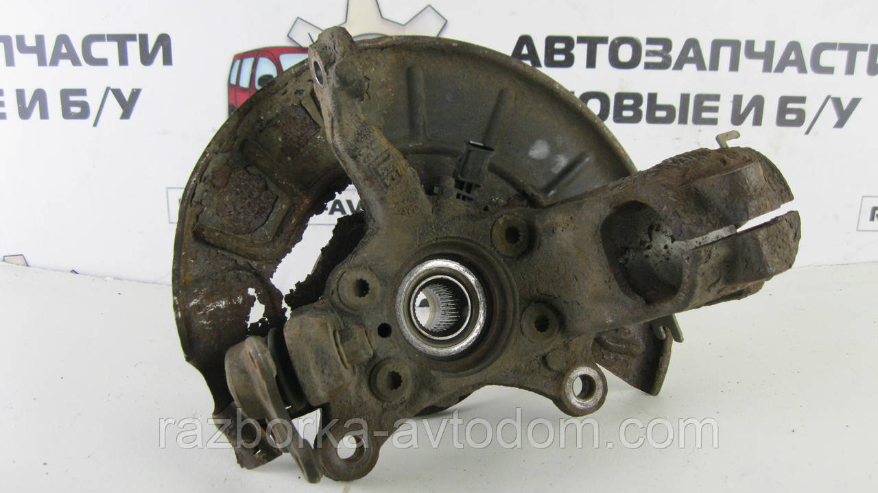 Поворотний кулак лівий (цапфа) з ABS (кріплення маточини 4 болти) VW Touran (03-10) OE:1K0407255AA