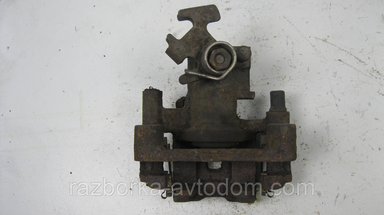 Суппорт задній лівий Nissan Sunny B12, N13 (1986-1988) OE:4401150A00