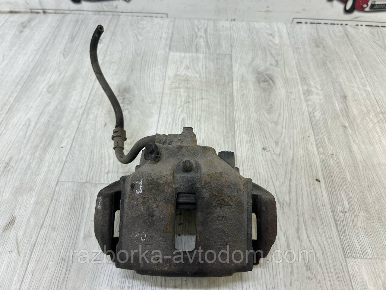 Суппорт Передній правий Opel Omega B (93-99) OE:90509197