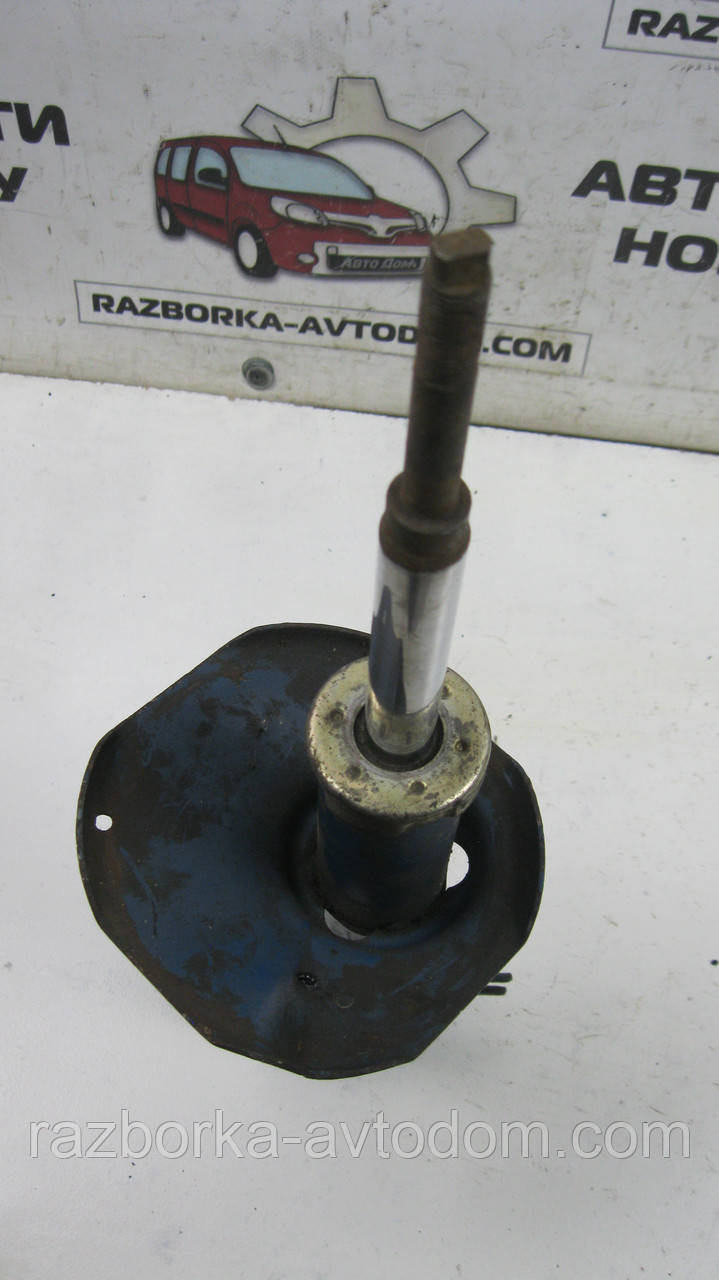 Амортизатор передній лівий Subaru Justy 2 (1995-2003), Suzuki Swift 2 (1989-2005) OE:4160280E10