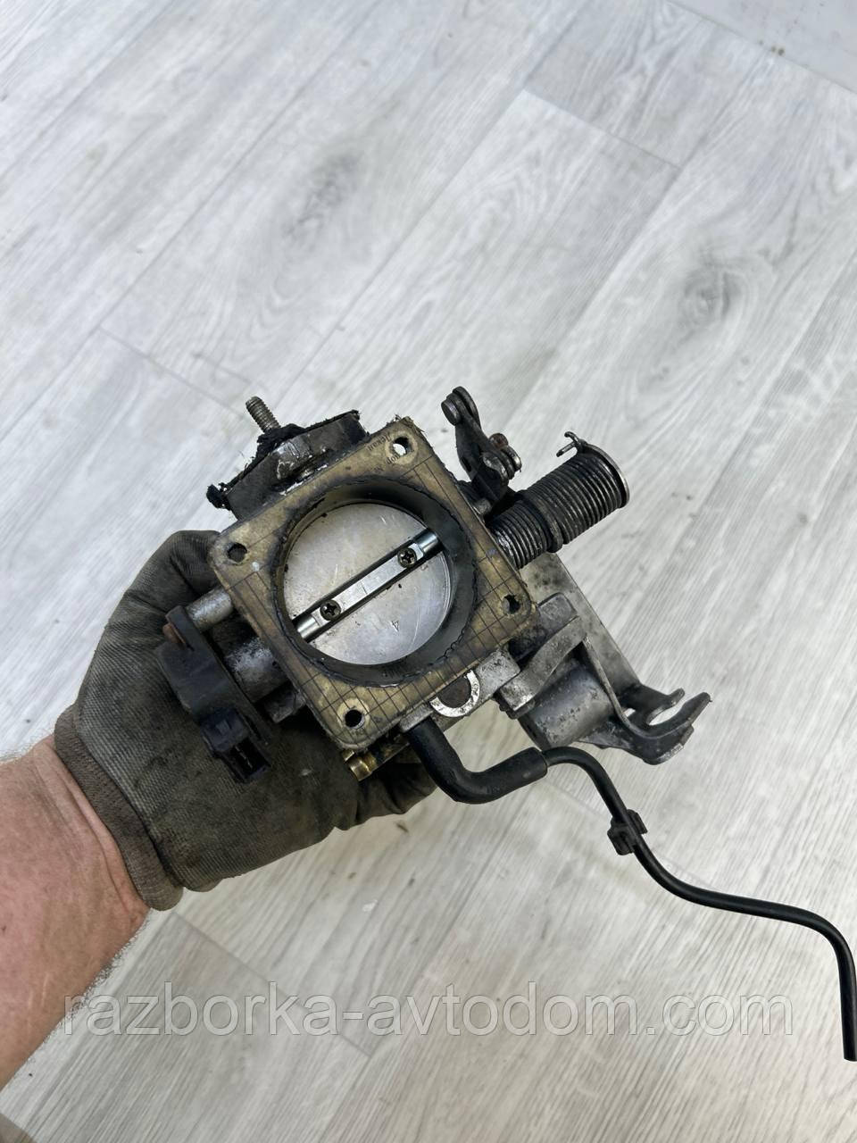 Дросельна заслінка 2,0i 16V x20xev Opel Omega B (93-03) OE:90411550